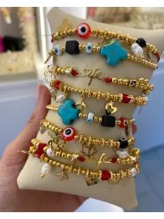 Pulseras ojitos & hilo chino