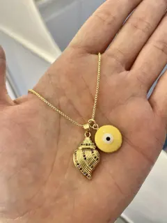 Collar - Doble dije de caracola de mar y ojito