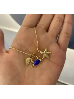 Collar triple con dijes marinos y playeros
